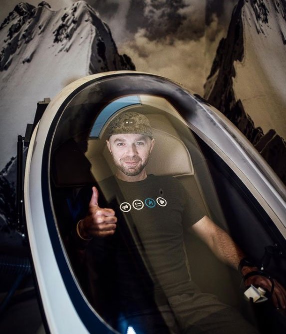 An athlete resting inside a CVAC Pod between training sessions.